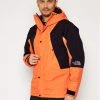 The North Face Veste outdoor Mountain Light NF0A3XY5 Orange Regular Fit